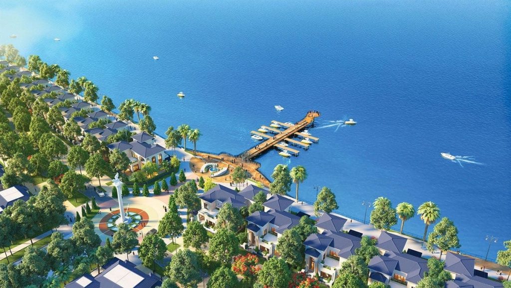 Tiện ích Vinhomes Cần Giờ 7 Hình ảnh công viên ven biển tại Vinhomes Cần Giờ với hàng cây xanh, lối đi bộ và bãi cỏ rộng, hướng ra biển Đông.